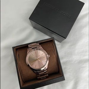 Rose Gold Michael Kors Women’s watch :) With original box and extra chain links!